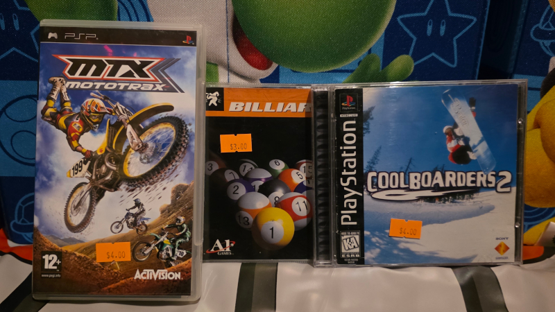 Billards, Cool Boarders 2, and some Motocross game